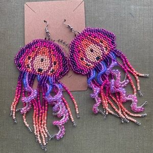 Jelly fish seed bead earrings! Pink and purple beaded on gold tone hook.